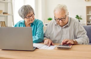 Couple of seniors going through finances.